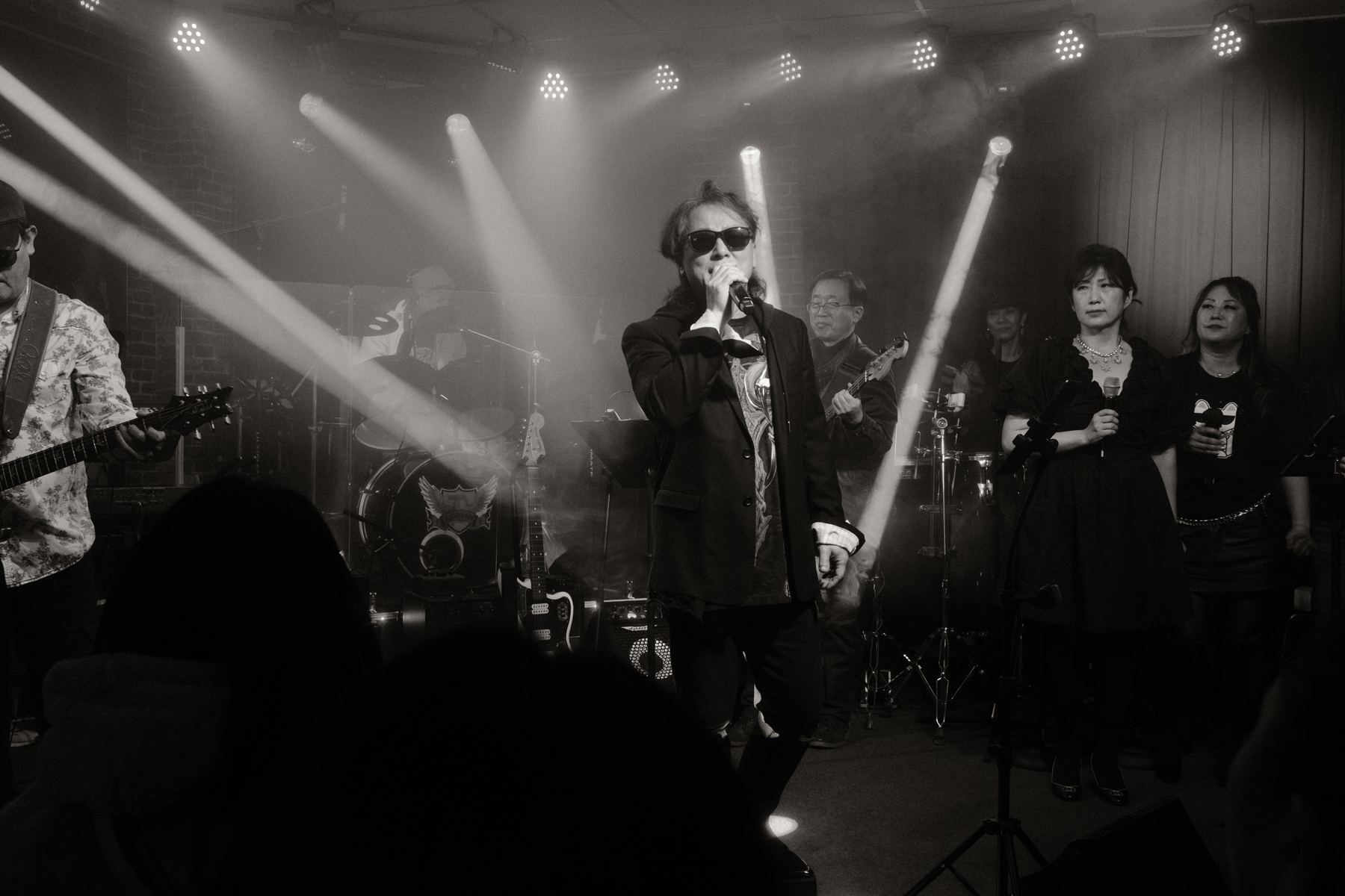 Stage light over a band