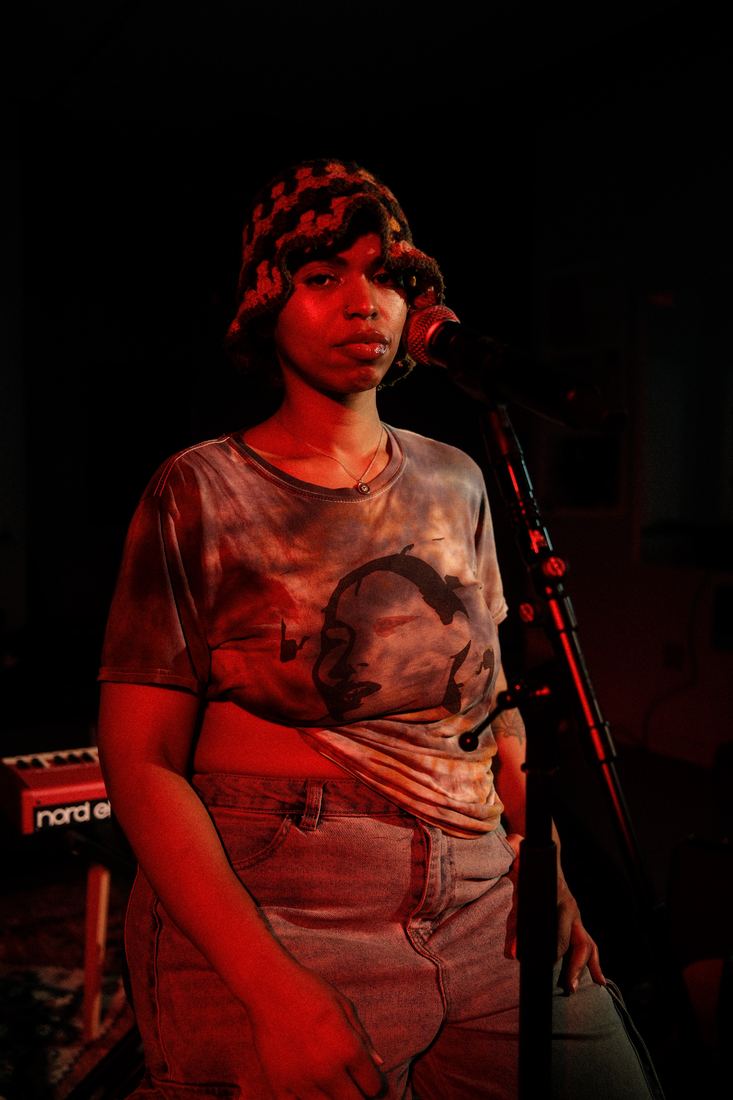 Singer lit in red