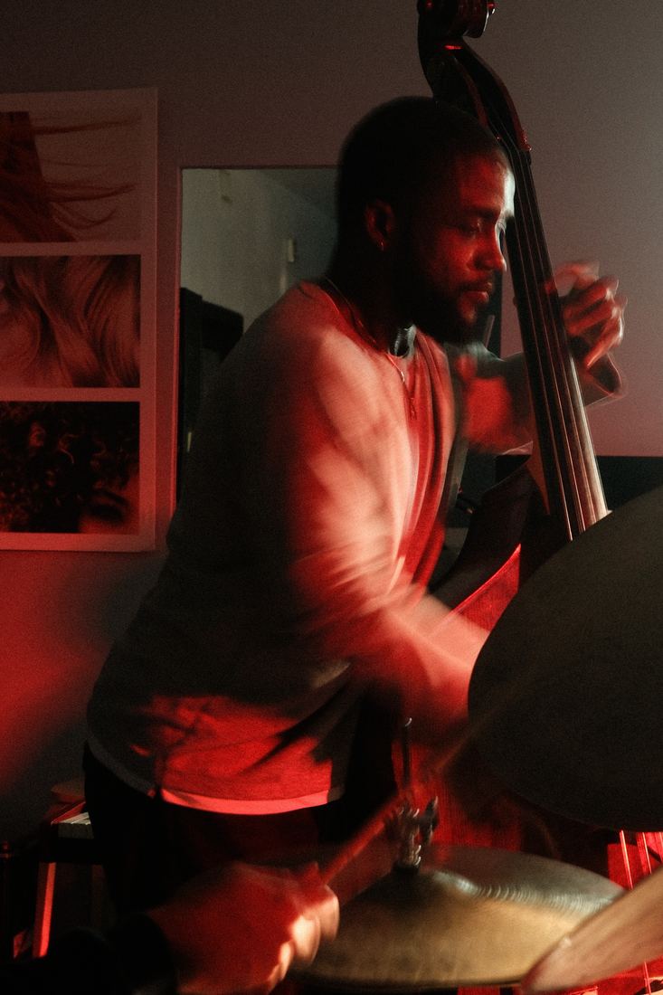 Upright bassist in red light