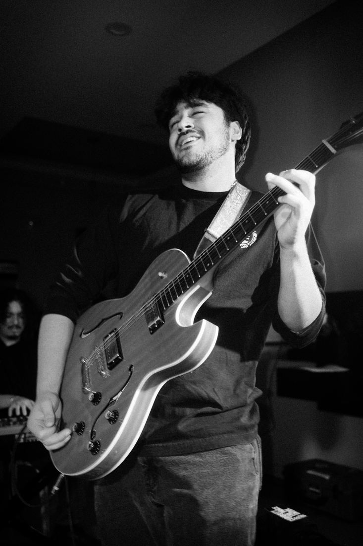 Guitarist laughing, black and white