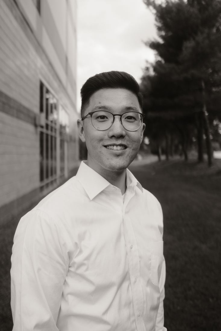 Portrait in a white shirt, black and white